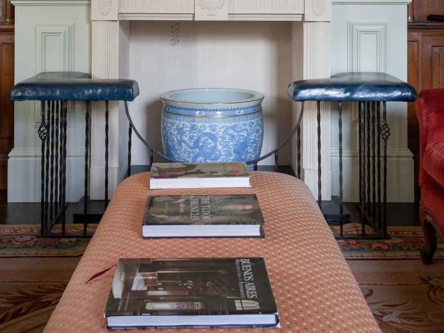 Fireplace within full-height painted Georgian panelling