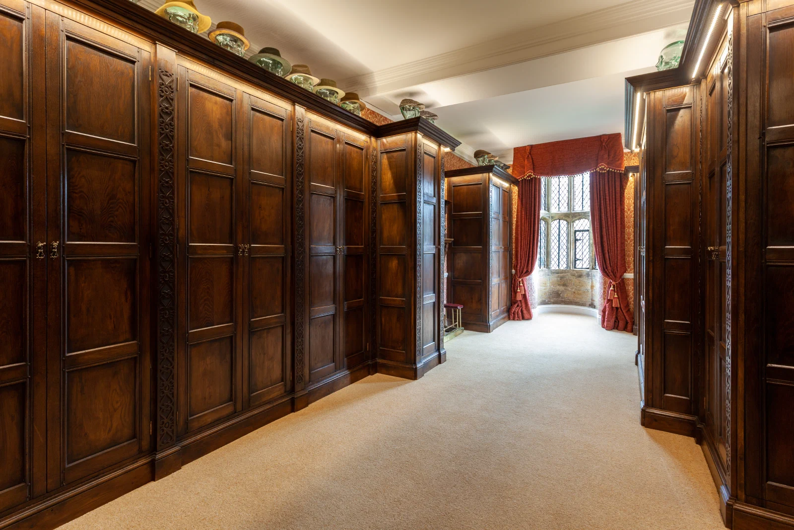 Bespoke panelled wardrobes in the Halstock Court dressing room
