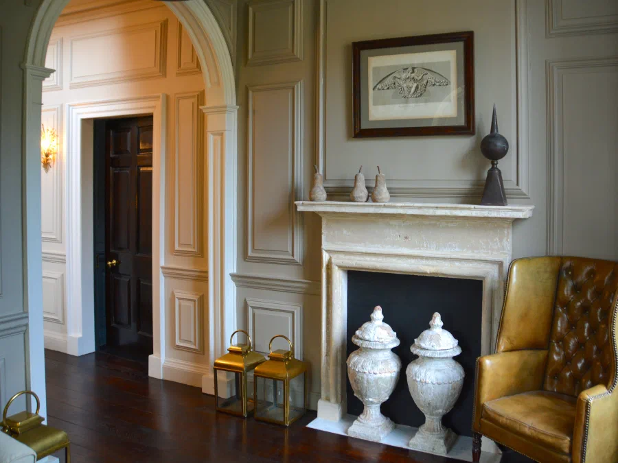 Fireplace and mantel within painted Georgian panelling