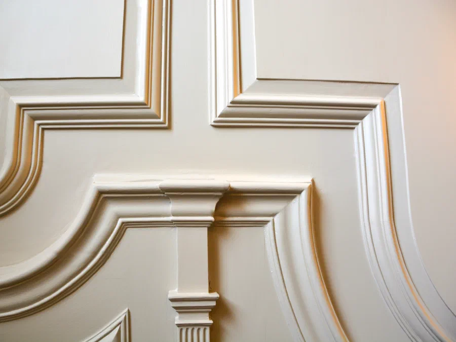 Close view of painted bolection mouldings