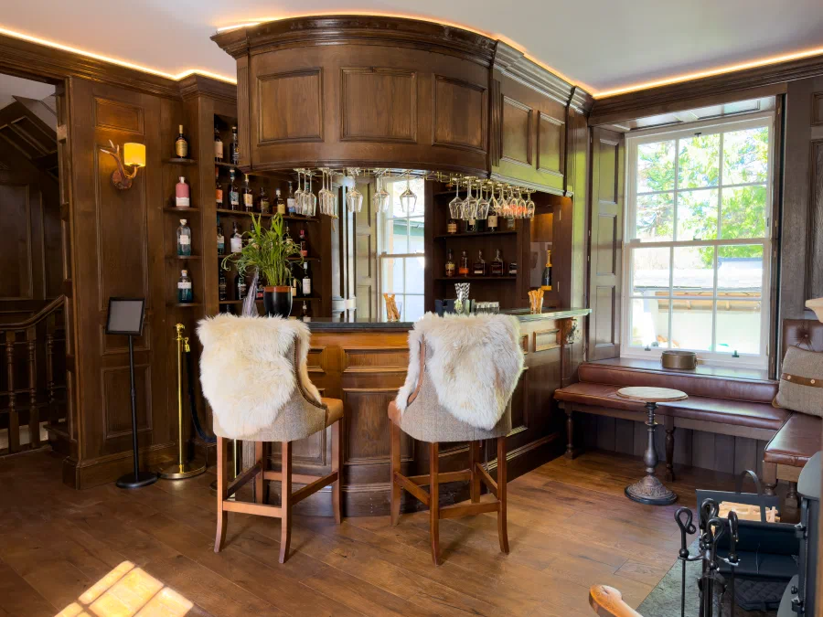 Wide view of the curved oak whisky bar