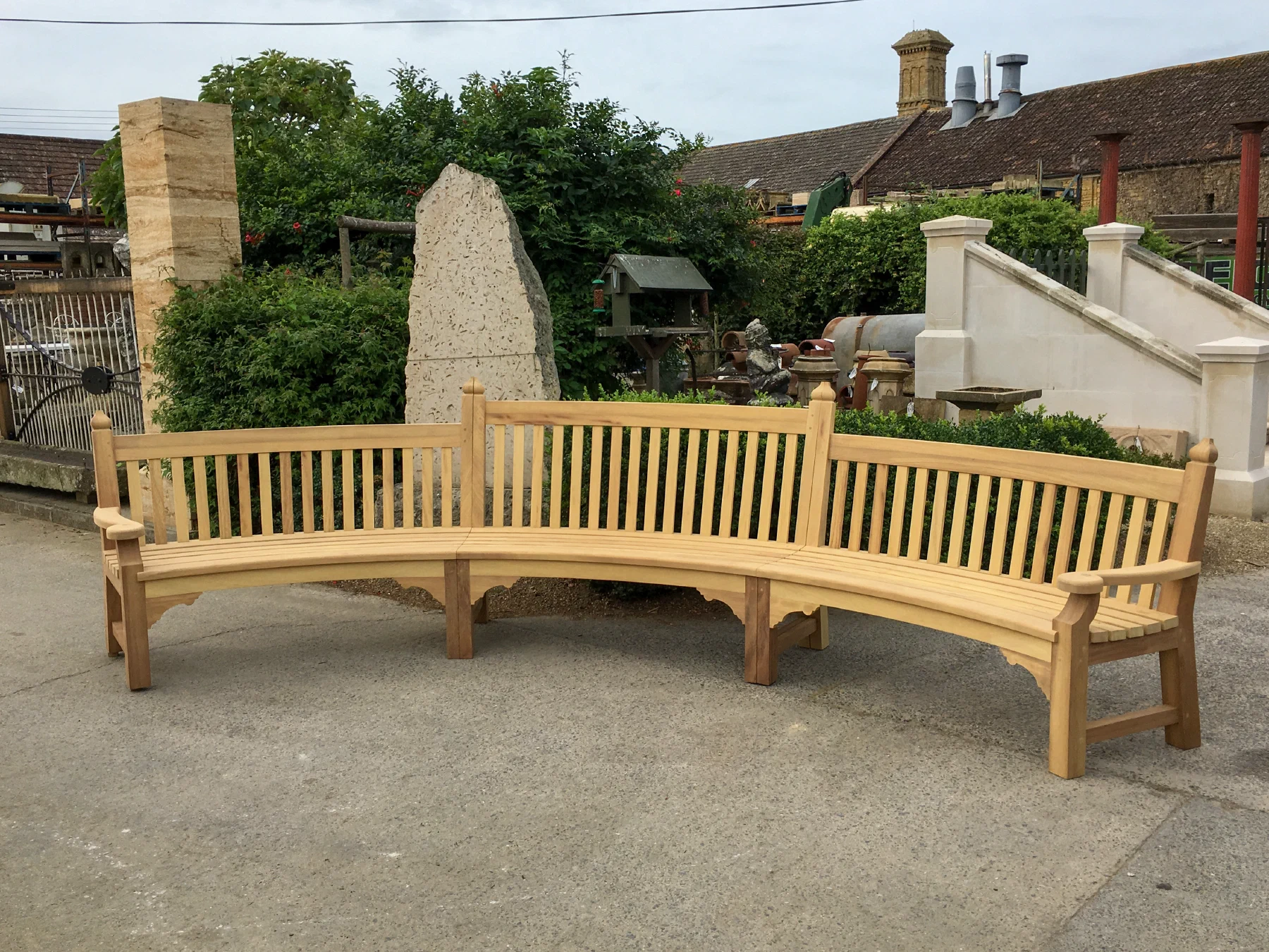 Curved timber garden bench