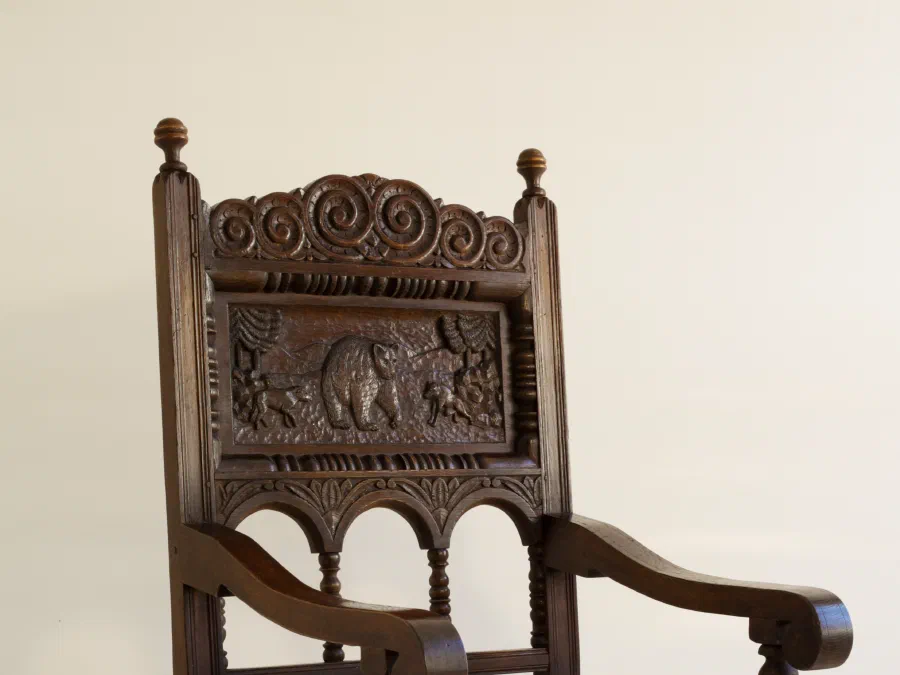 Carved early-English style armchair