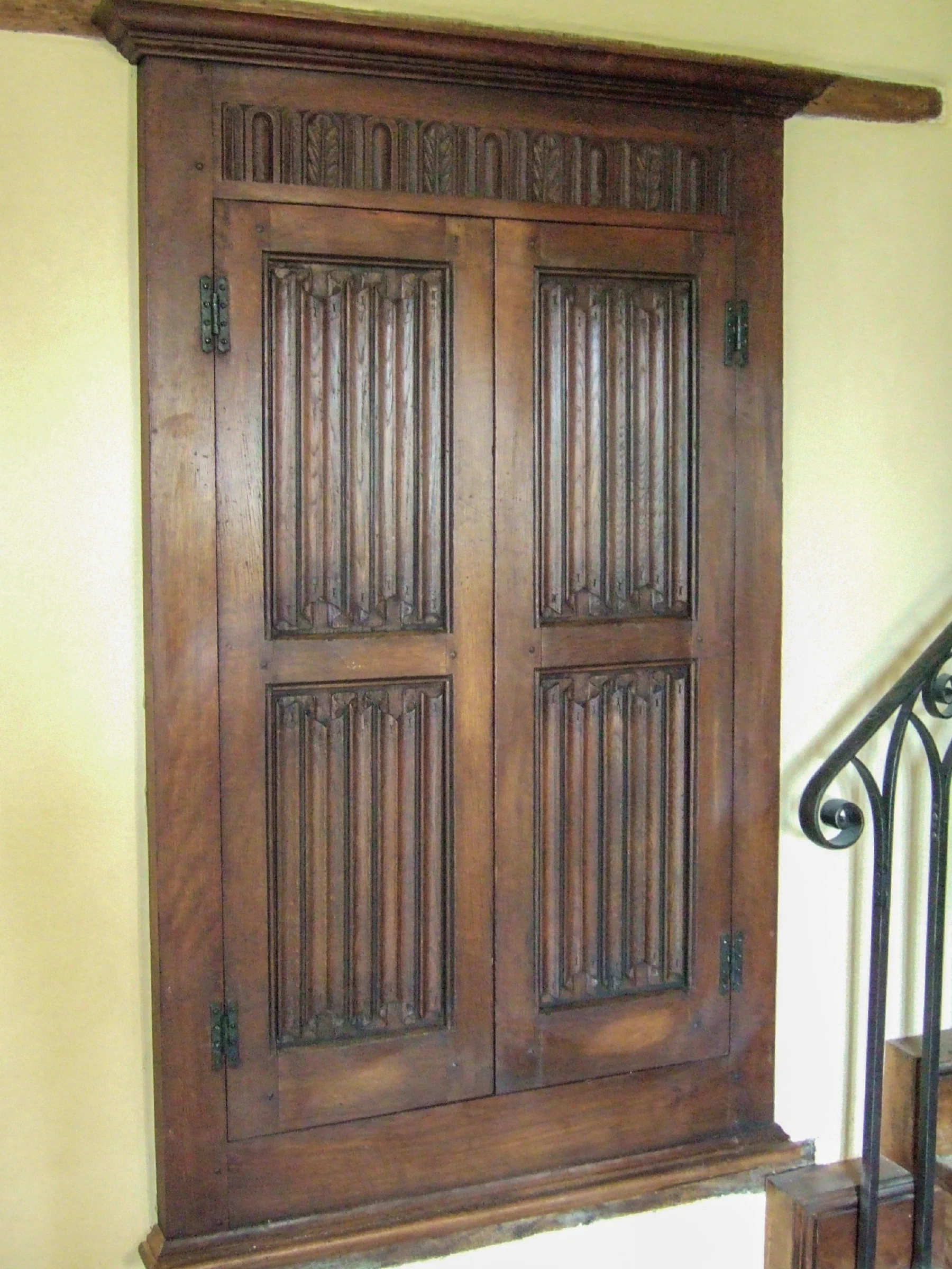 Oak cupboard with linenfold panelled doors