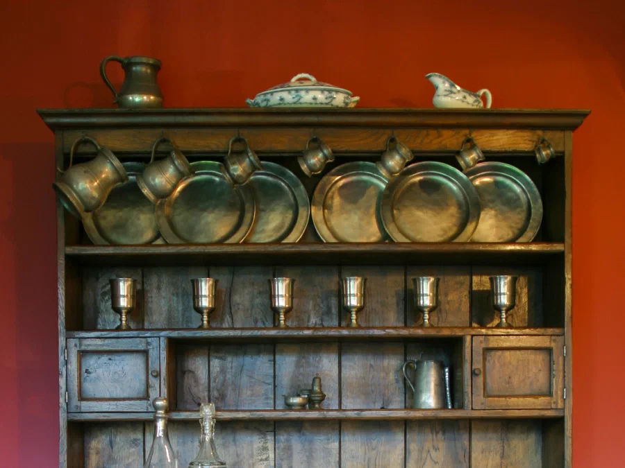 Oak dresser with open shelves above cupboards