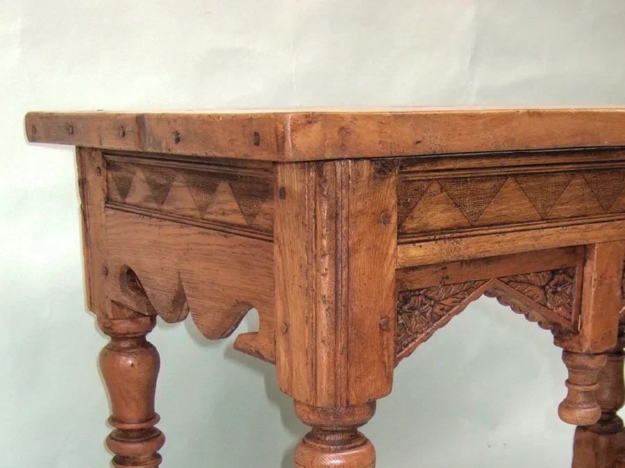 Small carved oak table with turned legs