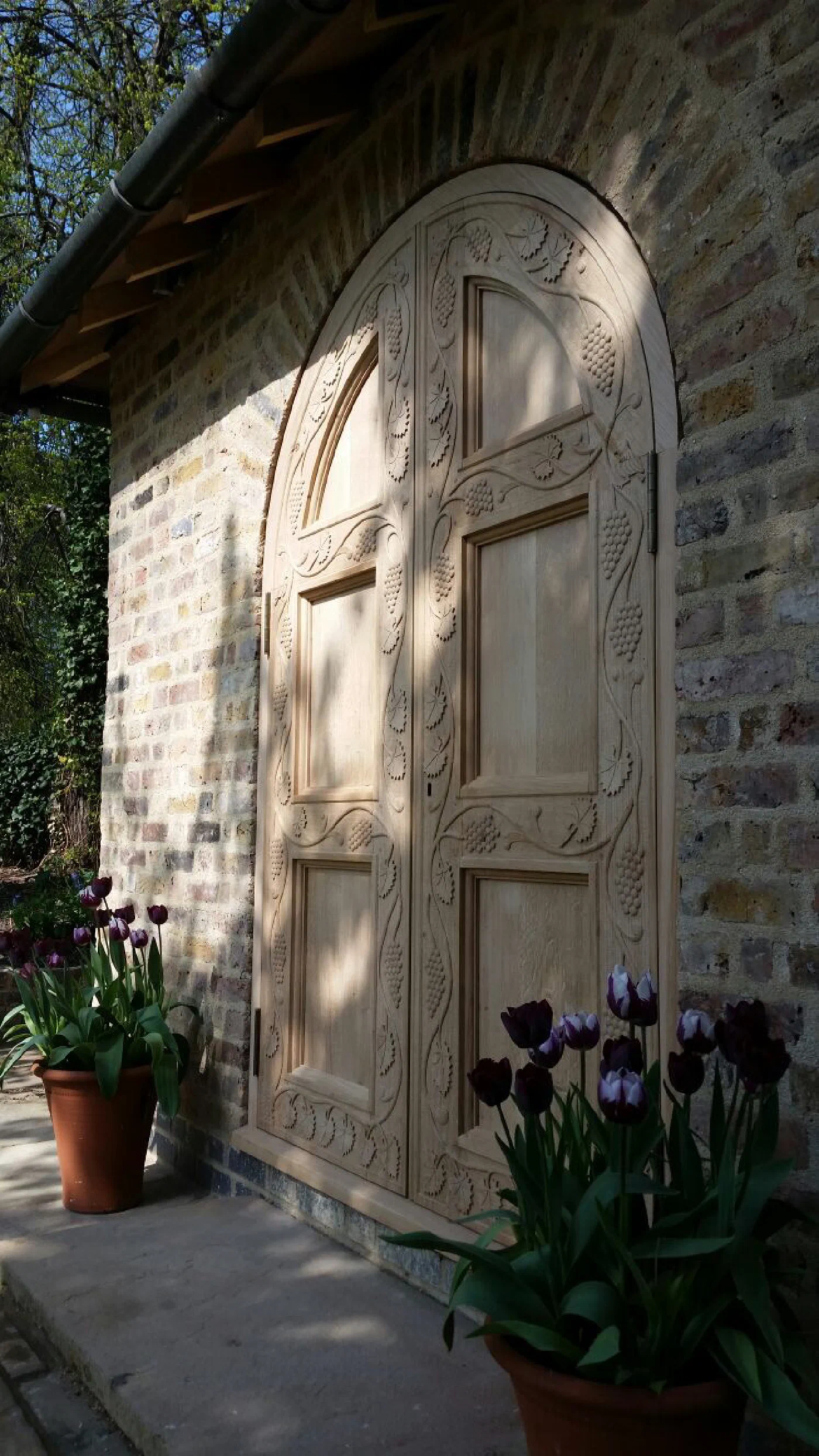 Heavily carved bespoke garden doors
