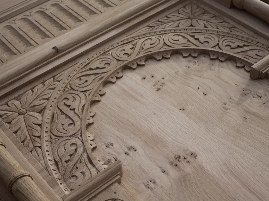 Carved arcaded oak panel before finishing