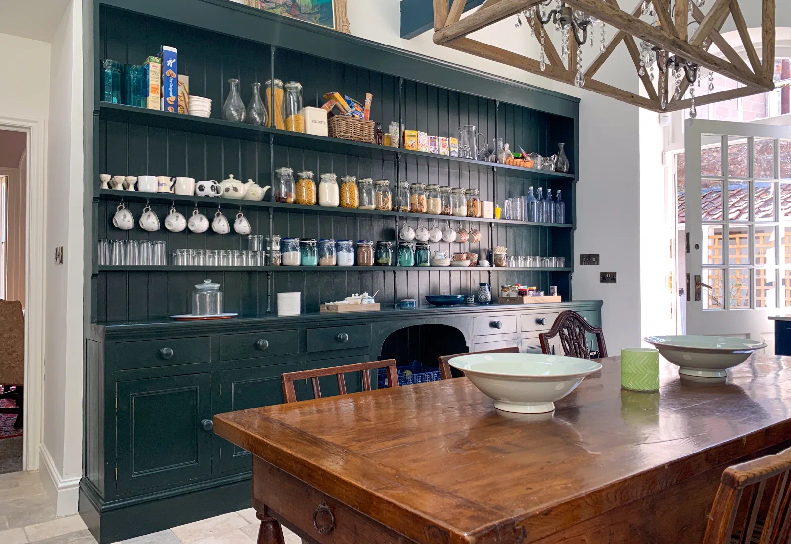 Painted kitchen dresser with open shelving, drawers and cupboards