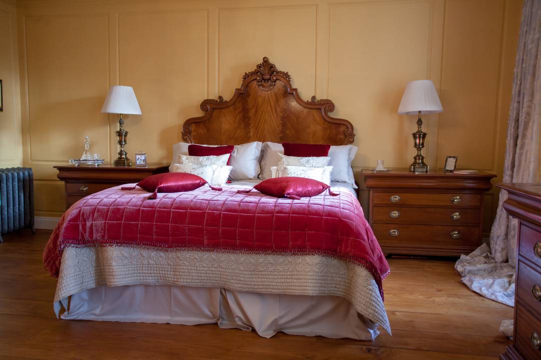 Hand carved and flame mahogany bed head board with side tables