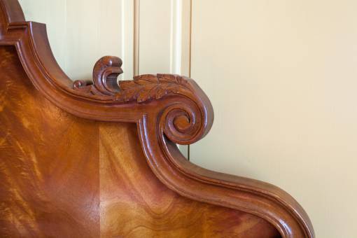 Carved Mahogany bed headboard detail