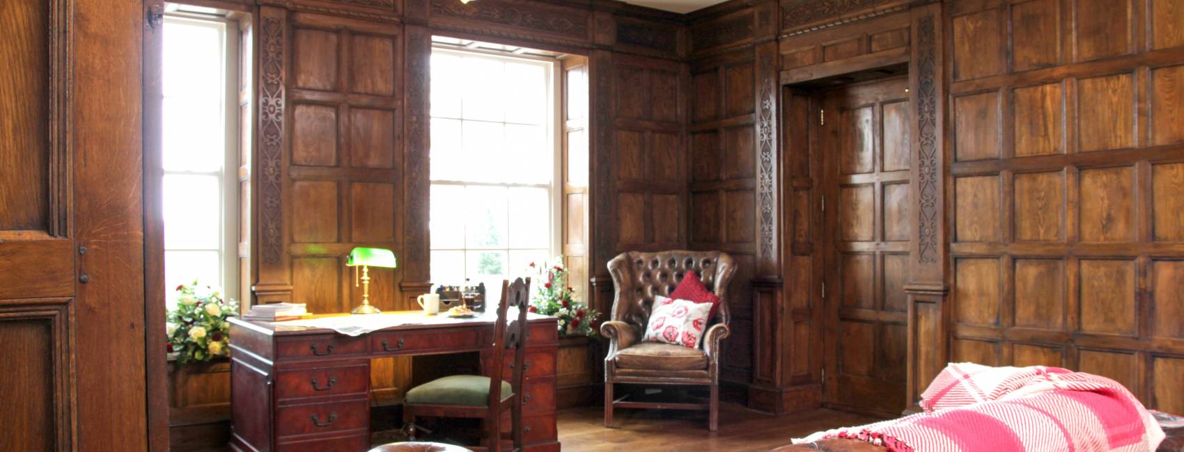 16th-17th Century Panelled room with carved foliate pilasters 