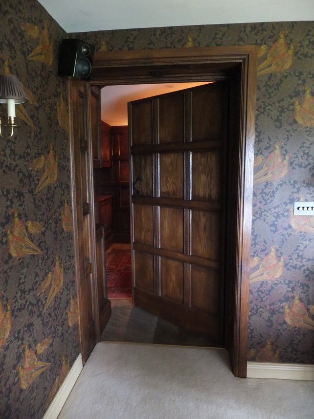 wide oak panelled door