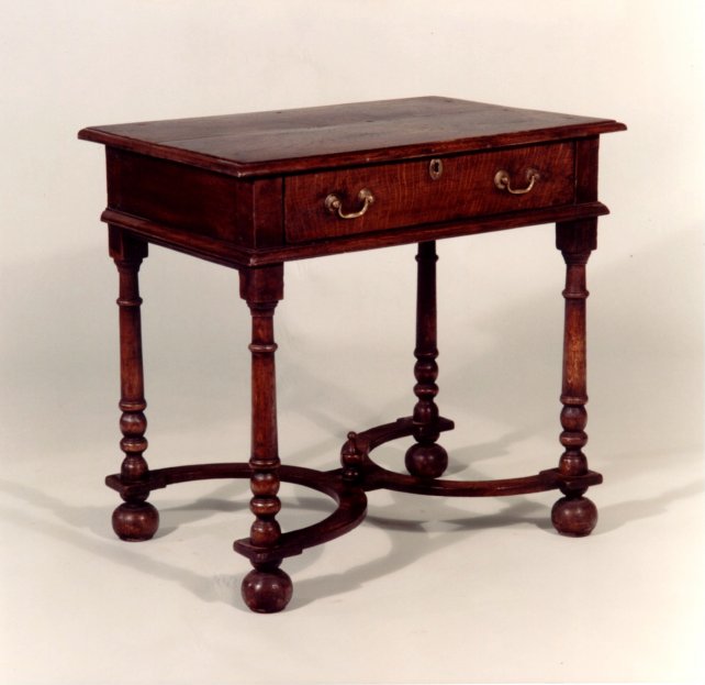 18th century oak side table with platform stretcher and bun feet