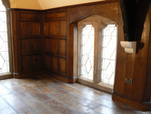 period oak panelled room with oak flooring