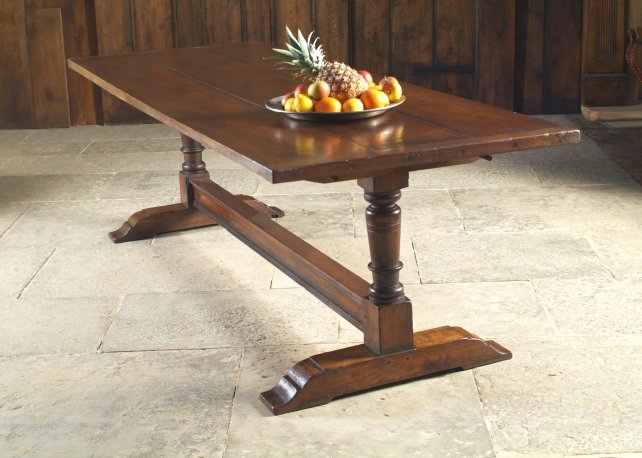 trestle table, aged and polished