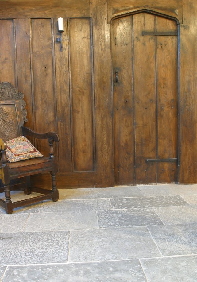 period plank and muntin screen with solid oak planked door