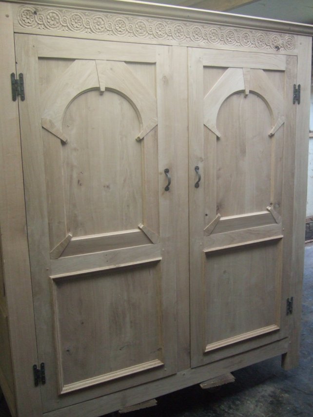 oak cupboard with decorative arched panels, unfinished