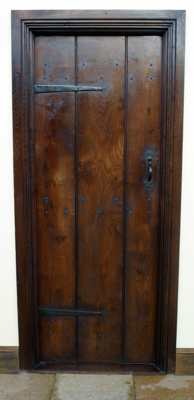 period planked door with door lining and architrave