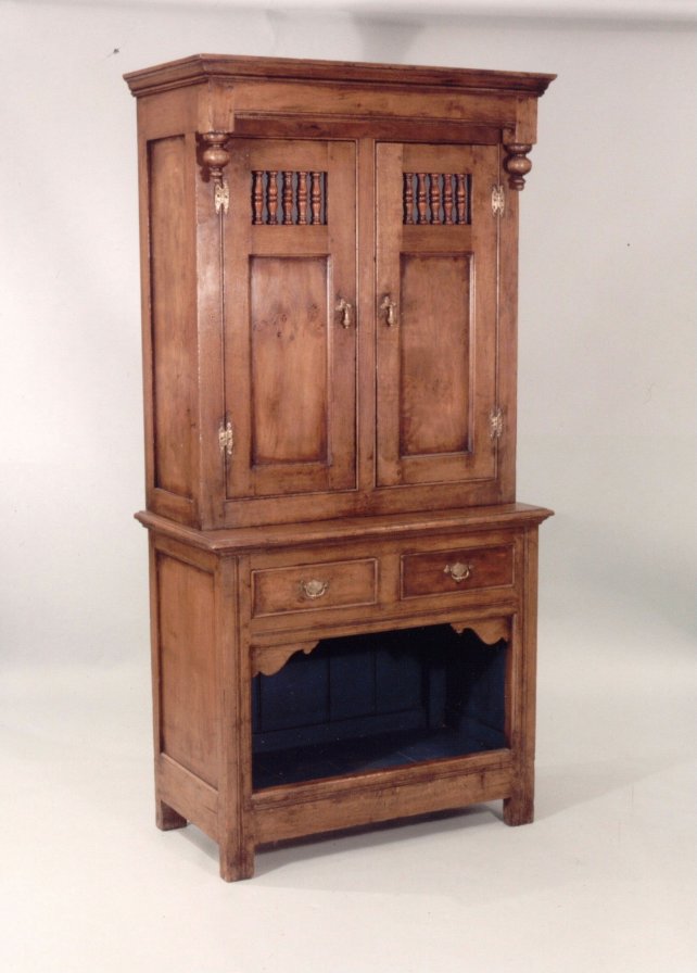 dresser with dog kennel base and drop finials