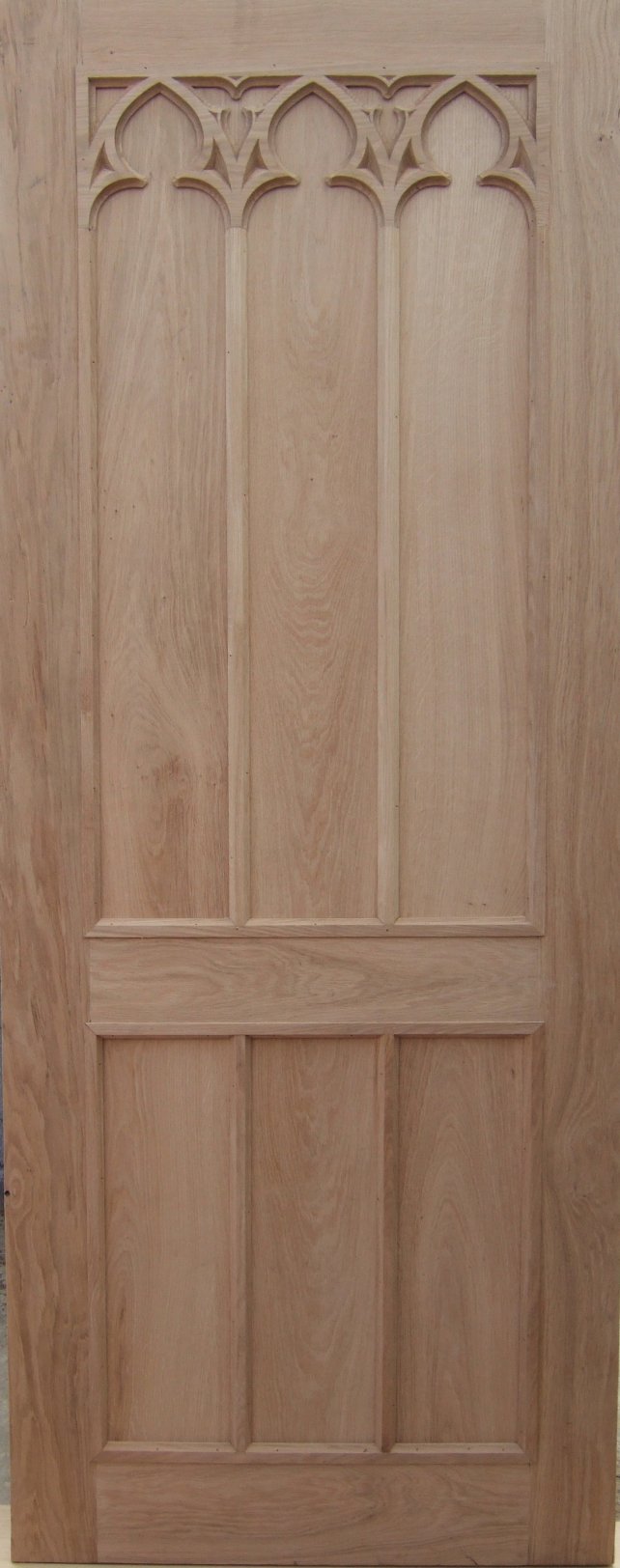 oak gothic tracery panelled door, hand carved