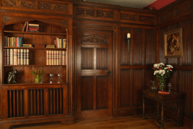 oak linenfold panelling as can be seen in our showroom