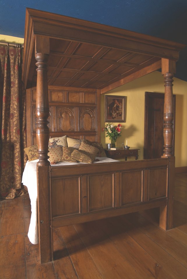 period four poster bed with hand carved panels
