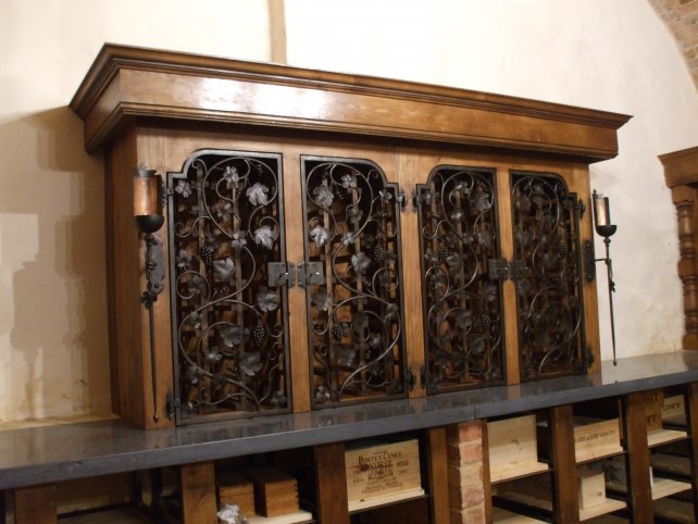 ornate hand forged grape and leaf iron grille