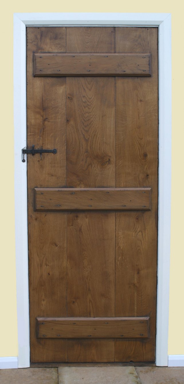 reverse side of our oak planked door showing the ledges