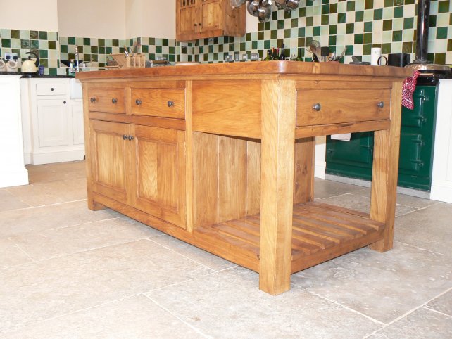 solid oak island unit with drawers and open rack