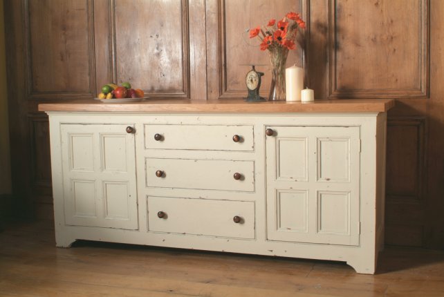 painted sideboard with oak worktop and moulded doors with an aged and painted finish