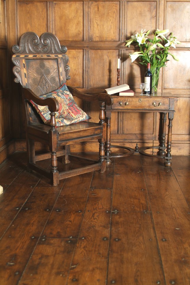 wainscot chair with carved inlay and 18th century side table with platform stretcher bun feet 