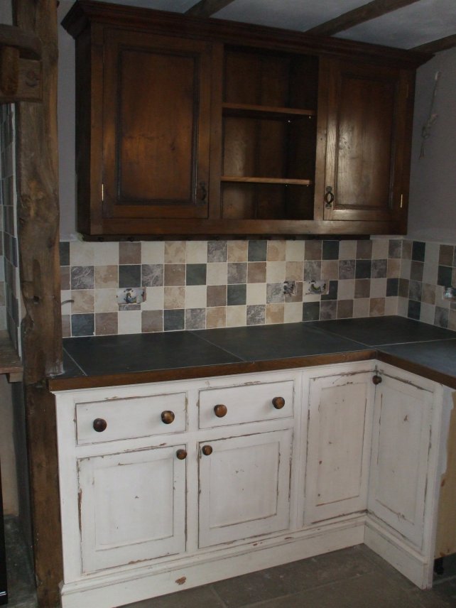 heavily aged and distressed kitchen