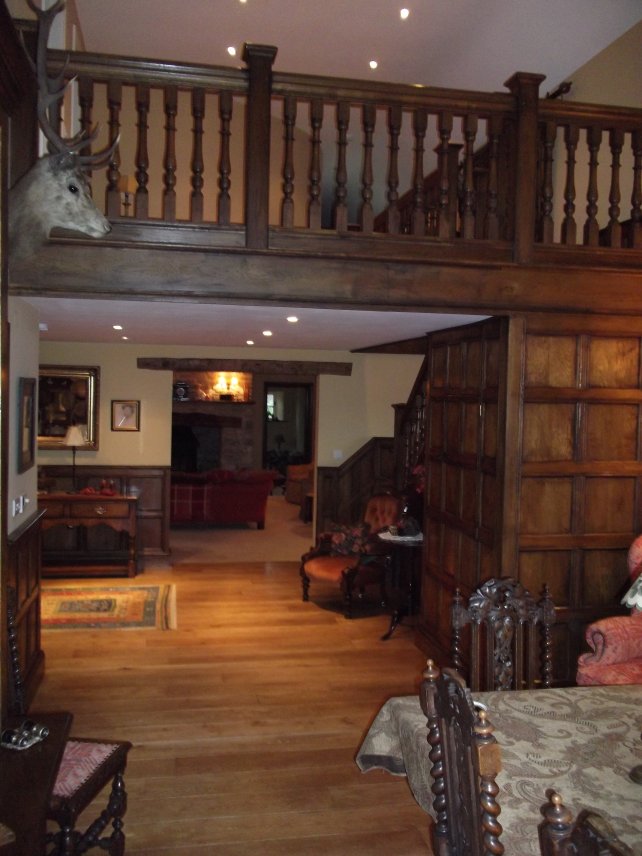 oak 16th century panelling with gallery landing, hand turned balusters