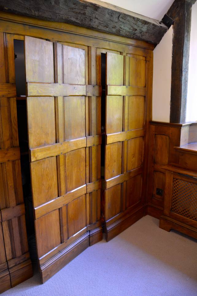 oak cupboard with secret panelled doors