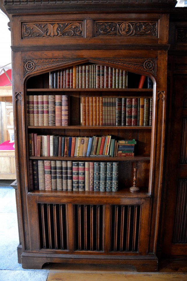 Gothic style bookcase with built in radiator cover