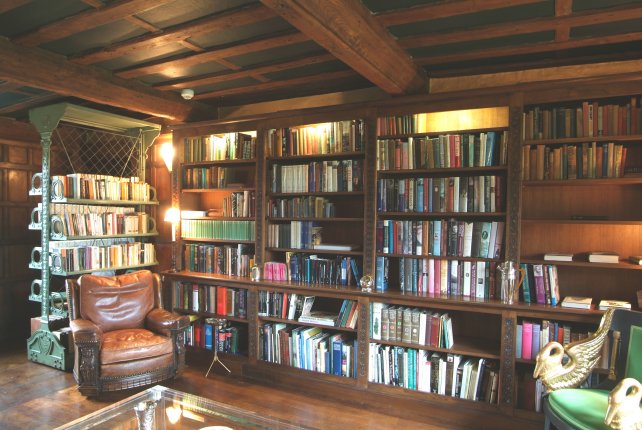 open bookcase with carved pilasters