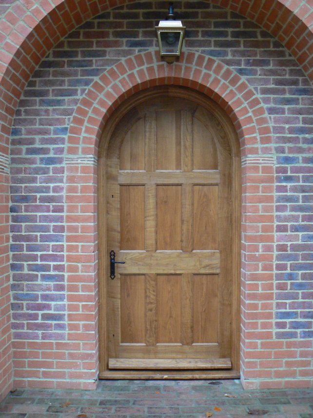 round topped panelled door in solid oak