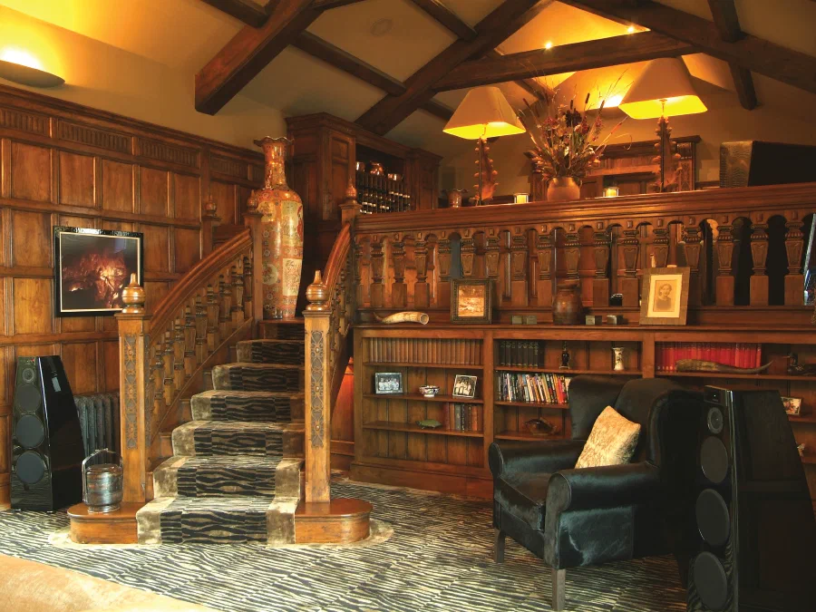Oak staircase and galleried landing in the panelled Great Hall at North Denton Farm